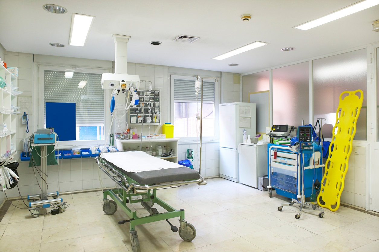 A white room containing medical equipment.