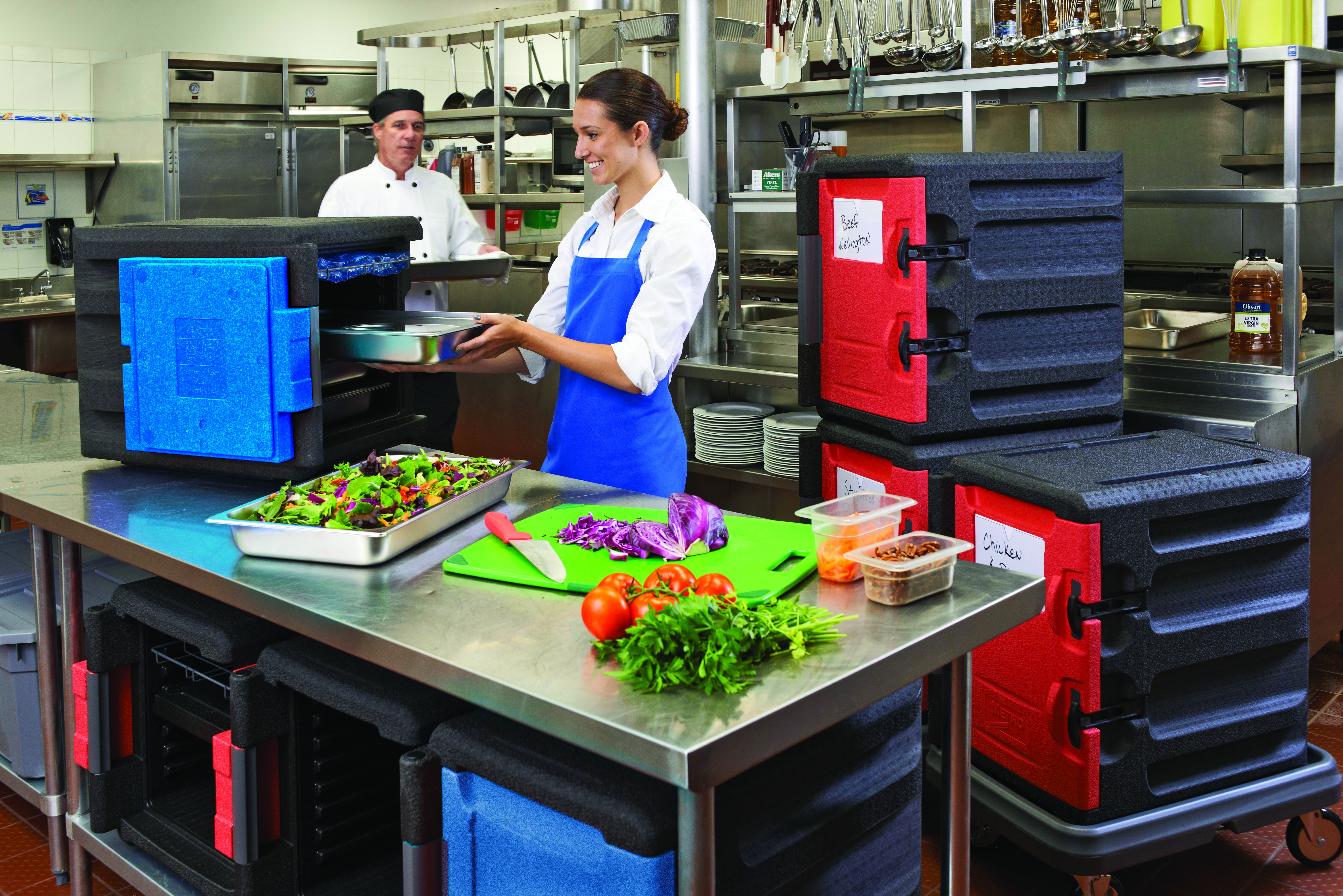 metro mightylite insulated food carriers in a commercial kitchen